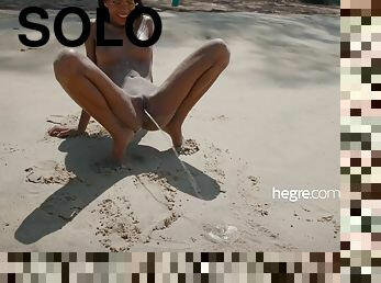 Hot mulatto Chloe pissing on Nude Beach