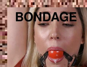 Blondie in on all fours bondage gets whip