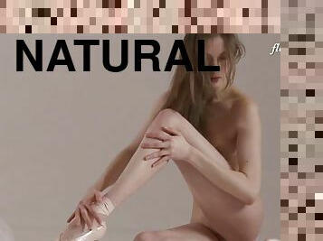 Ksenia Zavitukha with natural tits does nude gymnastics