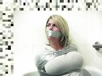 Busty bitch bound and gagged