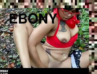 Ebony masturbates in the woods