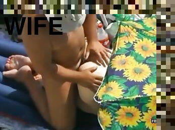 Sex with wife on a public beach