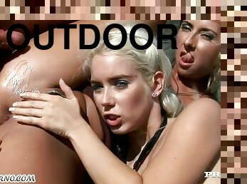 Wild women have a deep blow outdoors