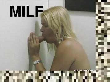 Blonde MILF Smoking and Sucking Cocks in Glory Hole