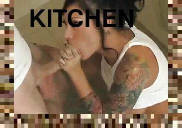 Tattooed girlfriend blows him in kitchen