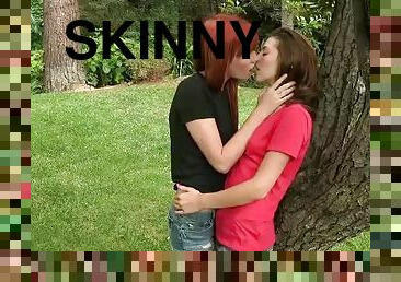 Skinny girls kissing and fingering