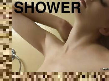 Blonde with big tits gets hot and horny in the shower