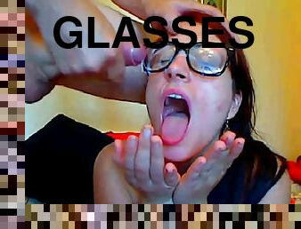 CamSlut gets huge facial cumshot and lick cum from her glasses
