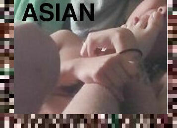 Cute asian sub licks my feet on a lazy afternoon