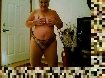 Webcam granny doing a tasty striptease