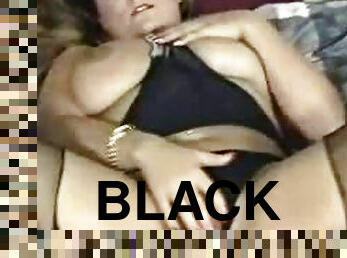Chubby bitch masturbates in sexy black pantyhose
