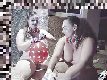 Lesbian Clowns Ride And Burst Balloons While Sucking On Dildos