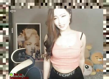 Korean cute camgirl in black leggings