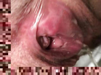 Wife let me look at her pissing gaping pussy, for which she get a huge cum load inside. Close-up.