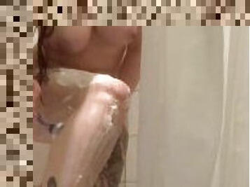 Milf with big tits shaving in the shower