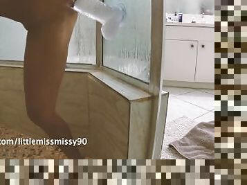 Petite Housewife fucks huge thick dildo in the shower