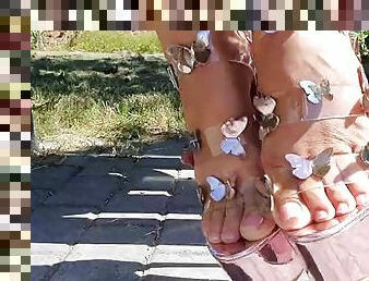 Outdoor foot fetish - hot milf in high heels