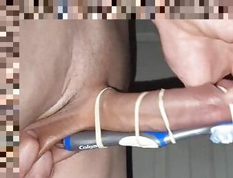 Twink Straps Vibrating Toothbrush to himself