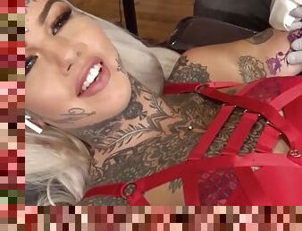 Amber Luke masturbates while getting a tattoo