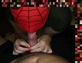 Spider woman in string gives her friend a good blowjob at a costume party ????????????