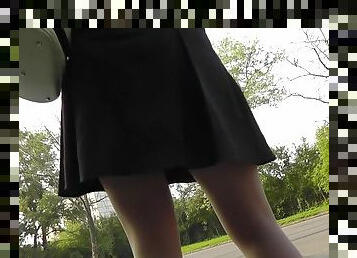 Sexy chick is walking in a hot short dress