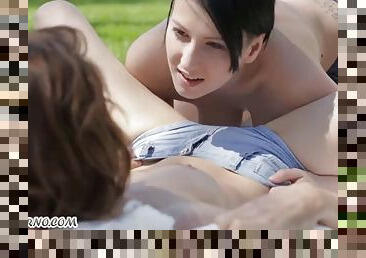 Impudent friends have lesbian sex on the grass outdoors