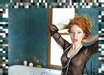 Redhead MILF with an amazing body in the shower
