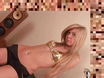 Shiny gold bikini top on skinny blonde babe