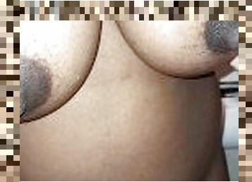 Ebony breast play