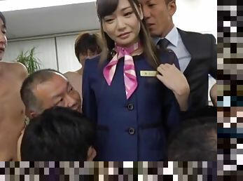 Japanese stewardess endures multiple partners for a wild fuck on cam