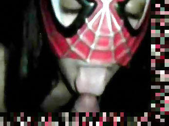 Spicy babe gives a blowjob in the spiderman mask