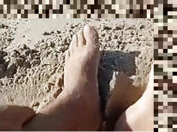 on the nudist beach horny showing off my feet